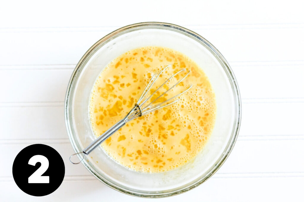 A pale yellow mixture of eggs and milk.