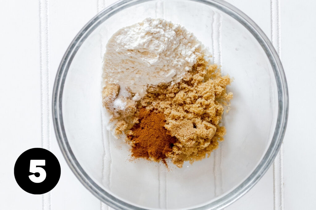A bowl with cinnamon, sugar and flour in it.