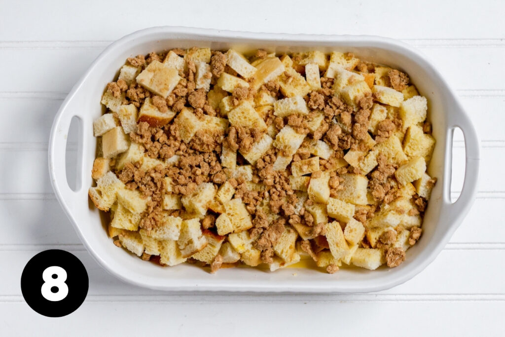 The casserole of bread chunks is topped with the crumbly brown sugar and butter mixture.